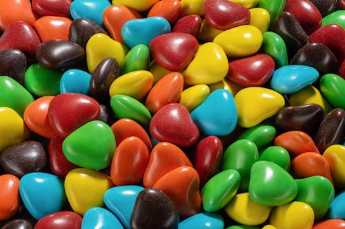 Countless Heart Shaped Multi-colored Candies in Close-up