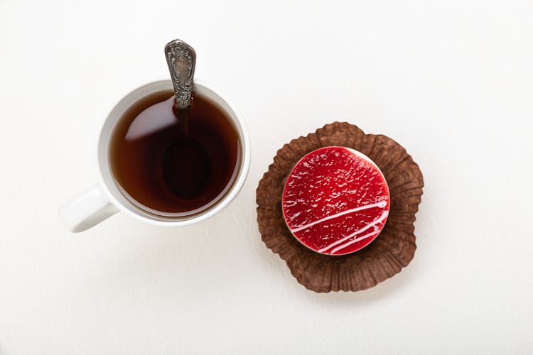 Cup Of Tea Served With Single Serve Cake