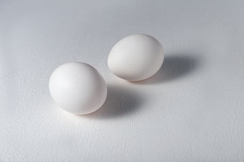 Free Eggs over White Surface Stock Photo