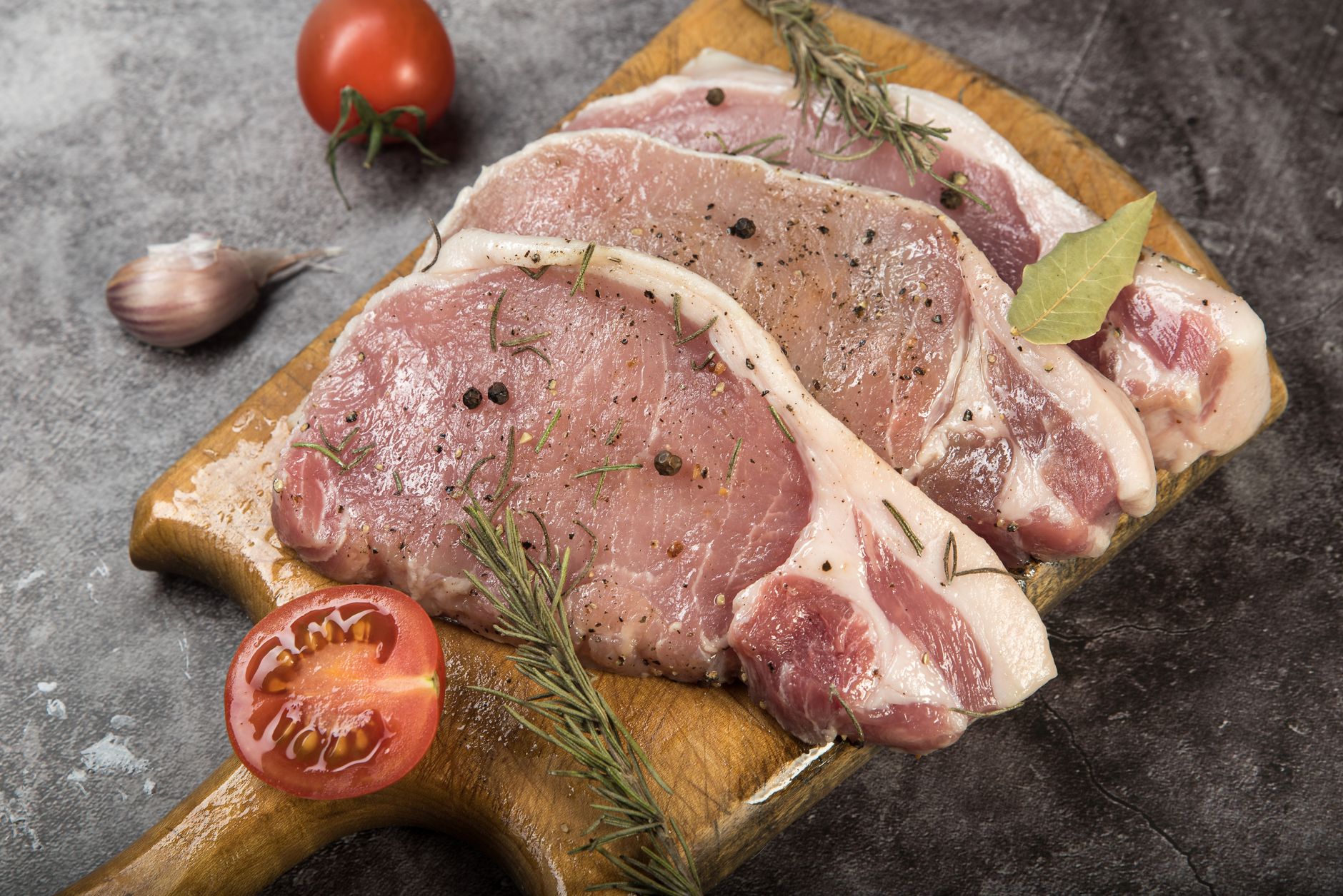 Sliced grilled pork loin with sauce
