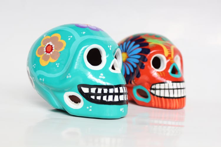 Close-up Photo Of Painted Skulls 