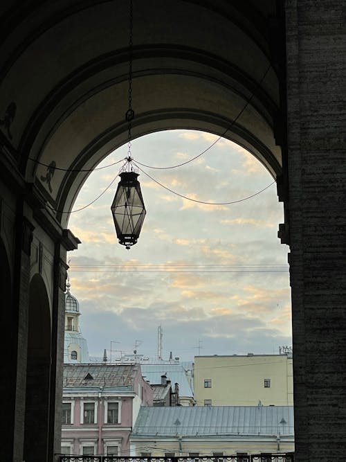 Free Arched passage with lamp in city Stock Photo
