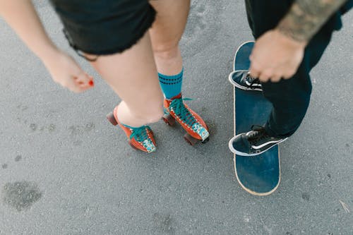 Free Two People using Skating Device  Stock Photo