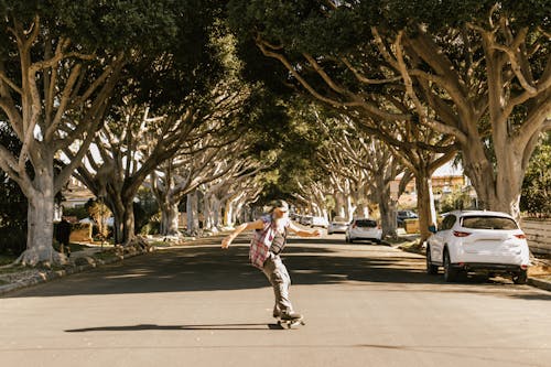 Elderly Man Riding a Skateboard