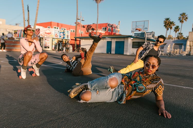 Roller Skaters Posing In A Basketball Court