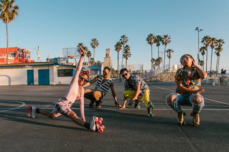 Group Of People Wearing Roller Skates