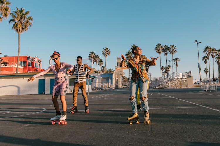 People Wearing Quad Skates Dancing