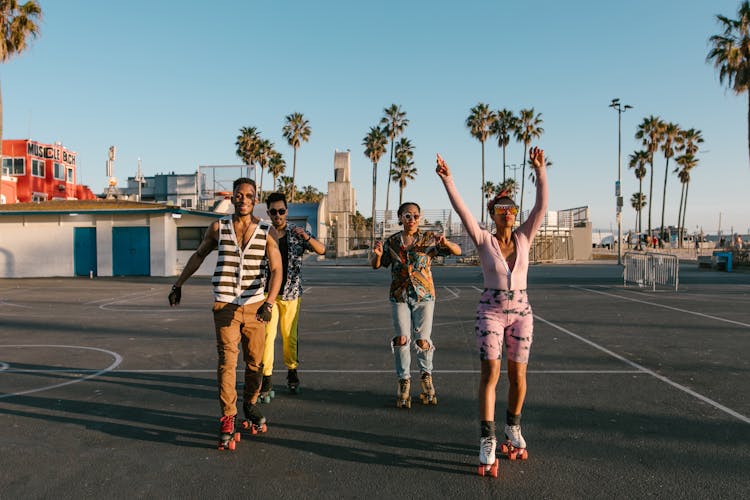 Roller Skaters On The Playground