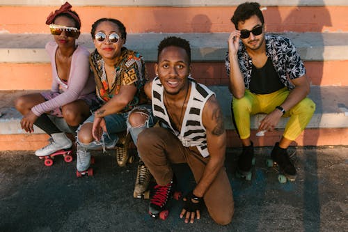 A Group of Friends Wearing Roller Skates