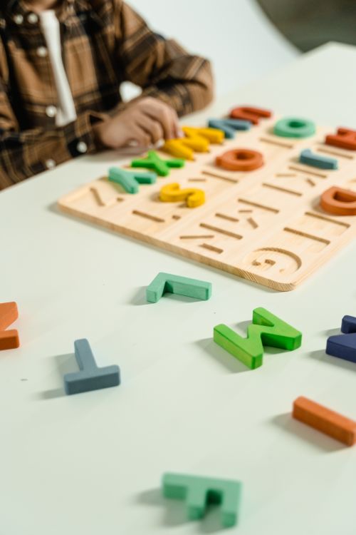 Free Colorful wooden alphabet letters for preschool children's learning and creativity. Stock Photo