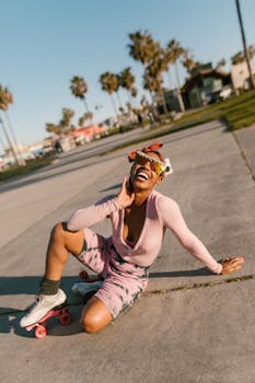 A woman enjoys roller skating with palm trees in the background, creating a vibrant, fun atmosphere.