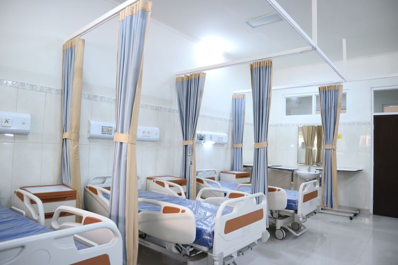 Hospital ward with patient beds