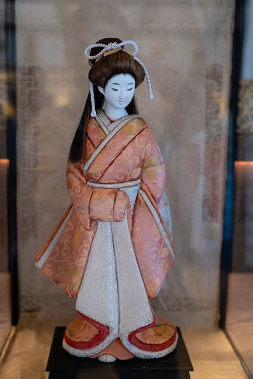 Traditional geisha doll in shop
