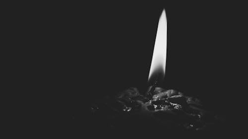 Lighted Candle Gray Scale Photo