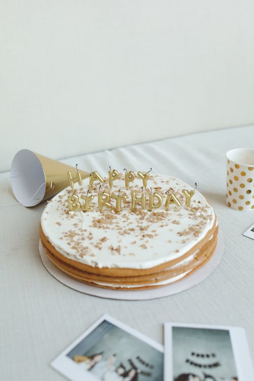 Birthday Cake with Candles on Table