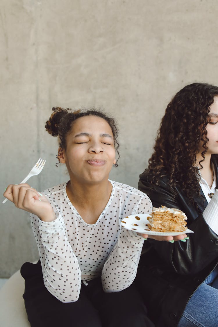 Woman Eating Cake