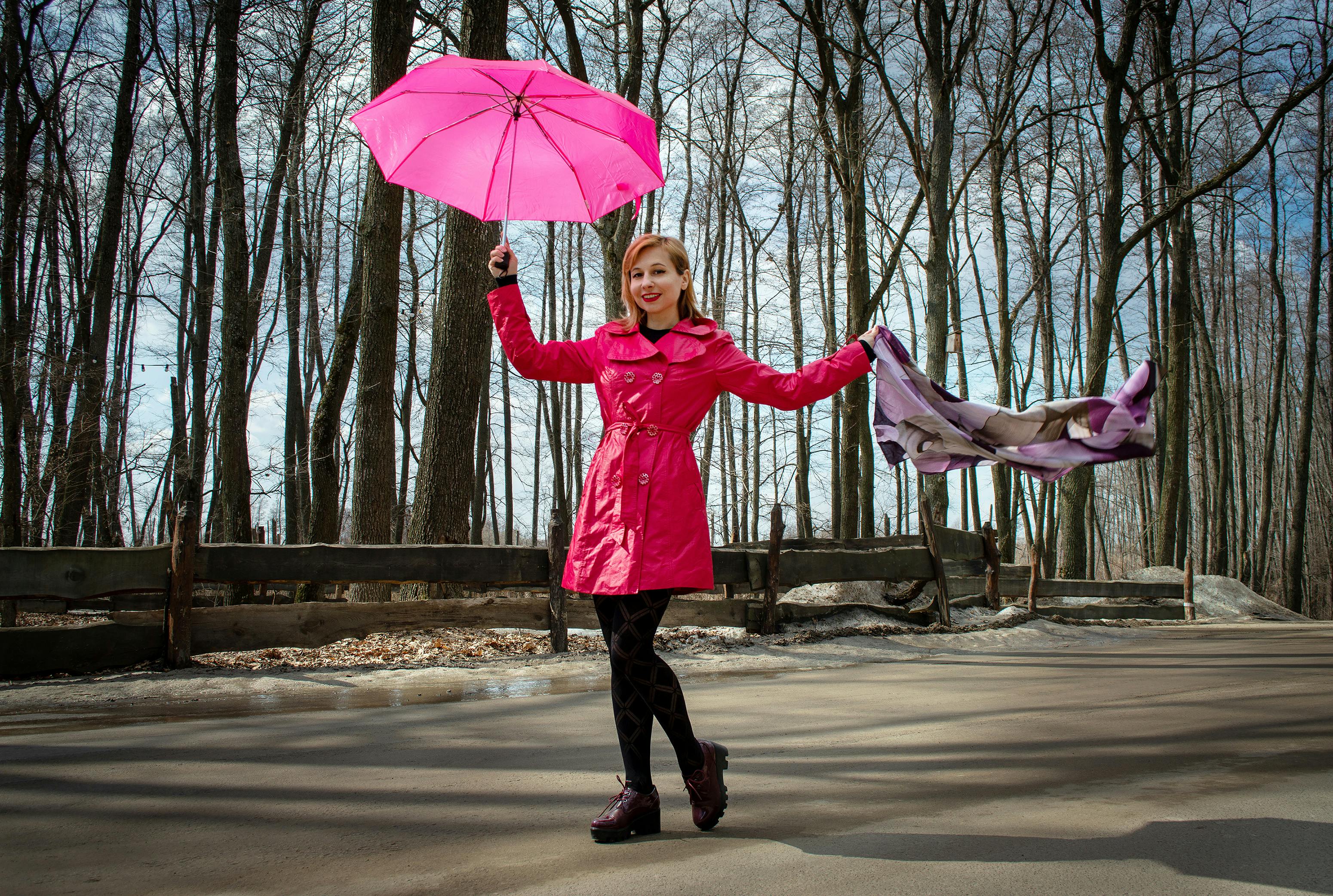 Girl in Pink Jacket Holding Pink Umbrella Standing on Road · Free Stock