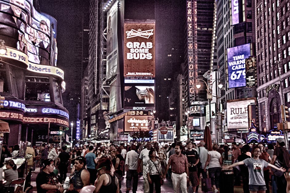 new york city people walking at night