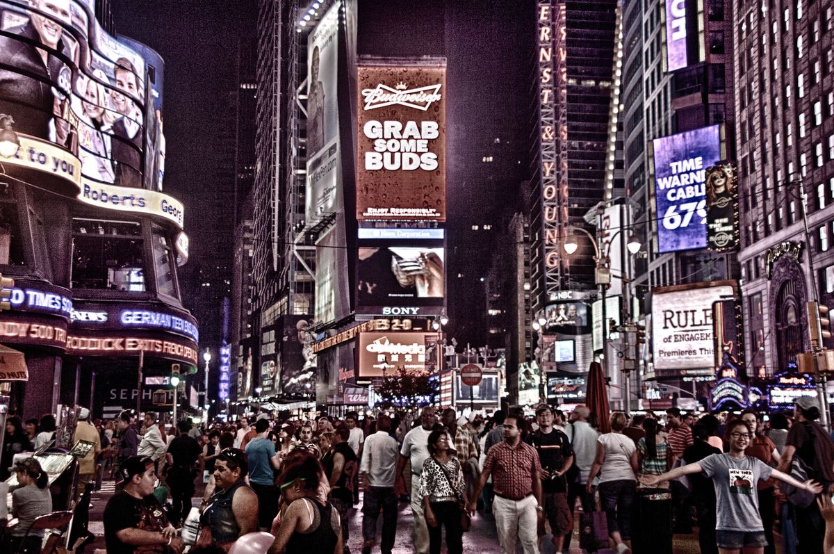 People walking through the busy streets of New York City