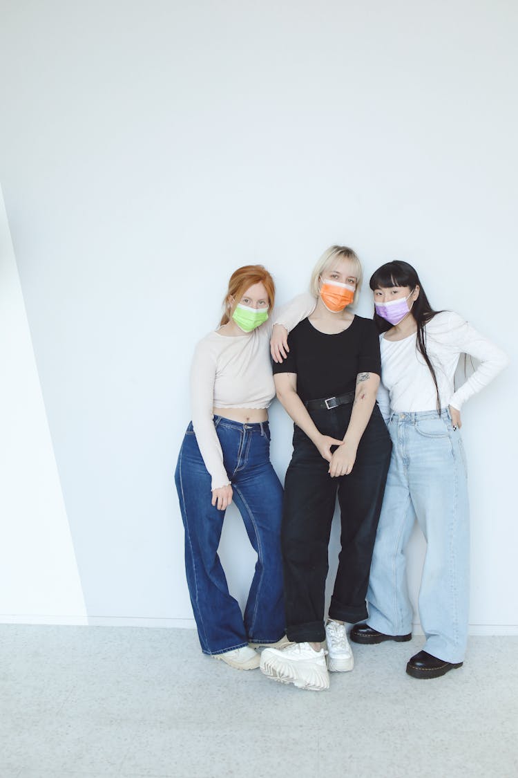 Group Of Young Women In Protective Masks