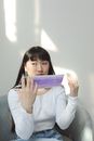 A Woman with Bangs Wearing a Face Mask
