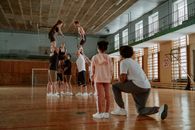 Dancer Rehearsing Inside a Basketball Court