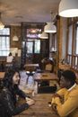 Man and Woman Sitting on Chair