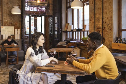 Free Two People meeting for the First Time in a Cafe
 Stock Photo