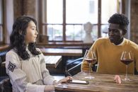 Man and Woman Sitting at Table