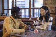 Man and Woman Sitting at Table