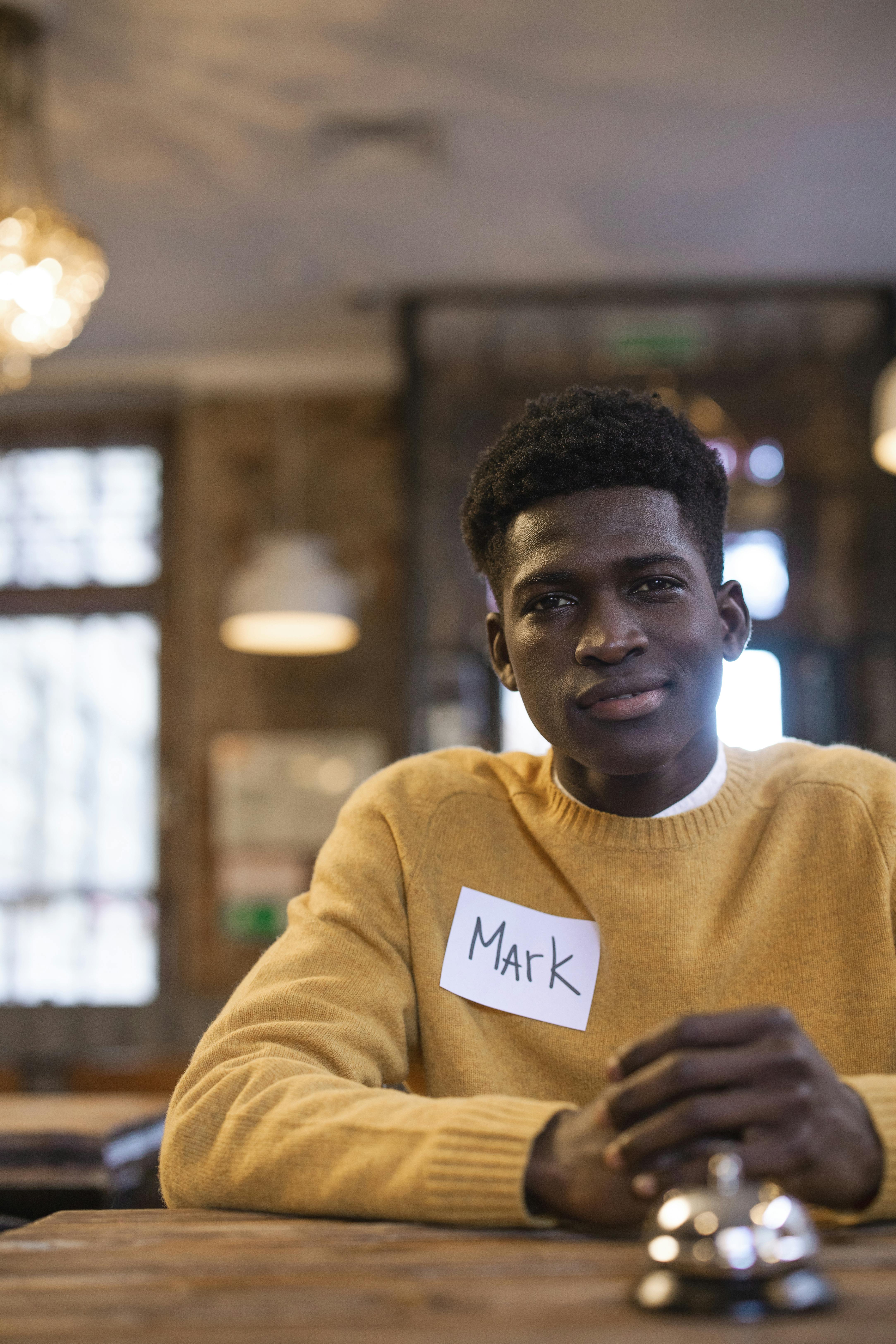 a man wearing a name tag