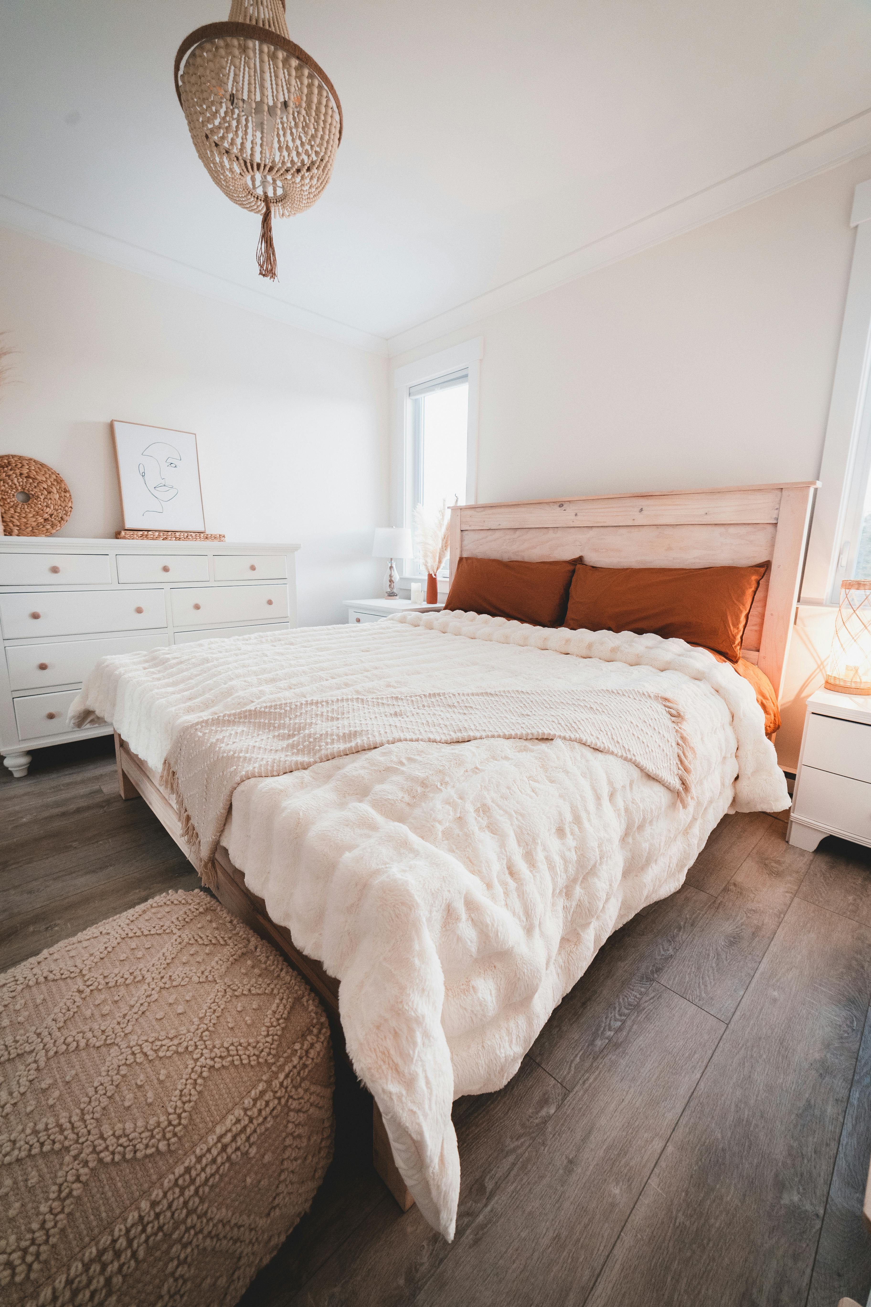 Wood bed store with white nightstands