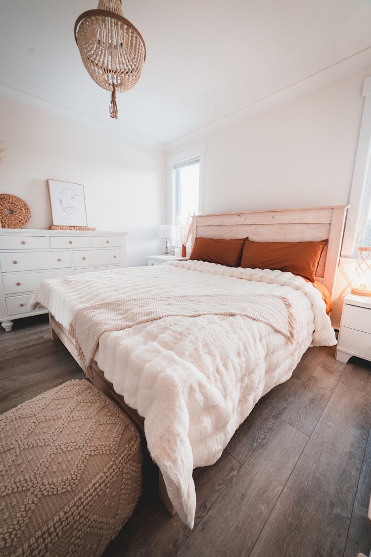 Bedroom With Bed And Nightstands Near Commode