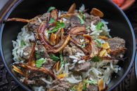 Cooked Food on Black Plate