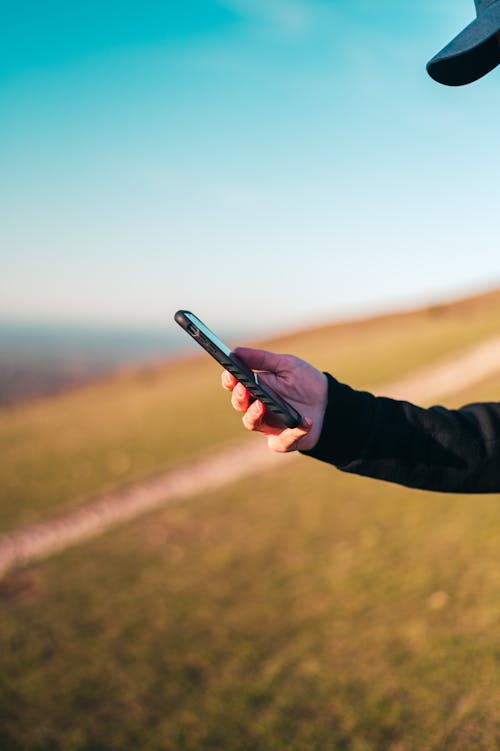 Free stock photo of ben collins, iphone, man standing