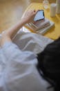 A Woman Checking Her Phone