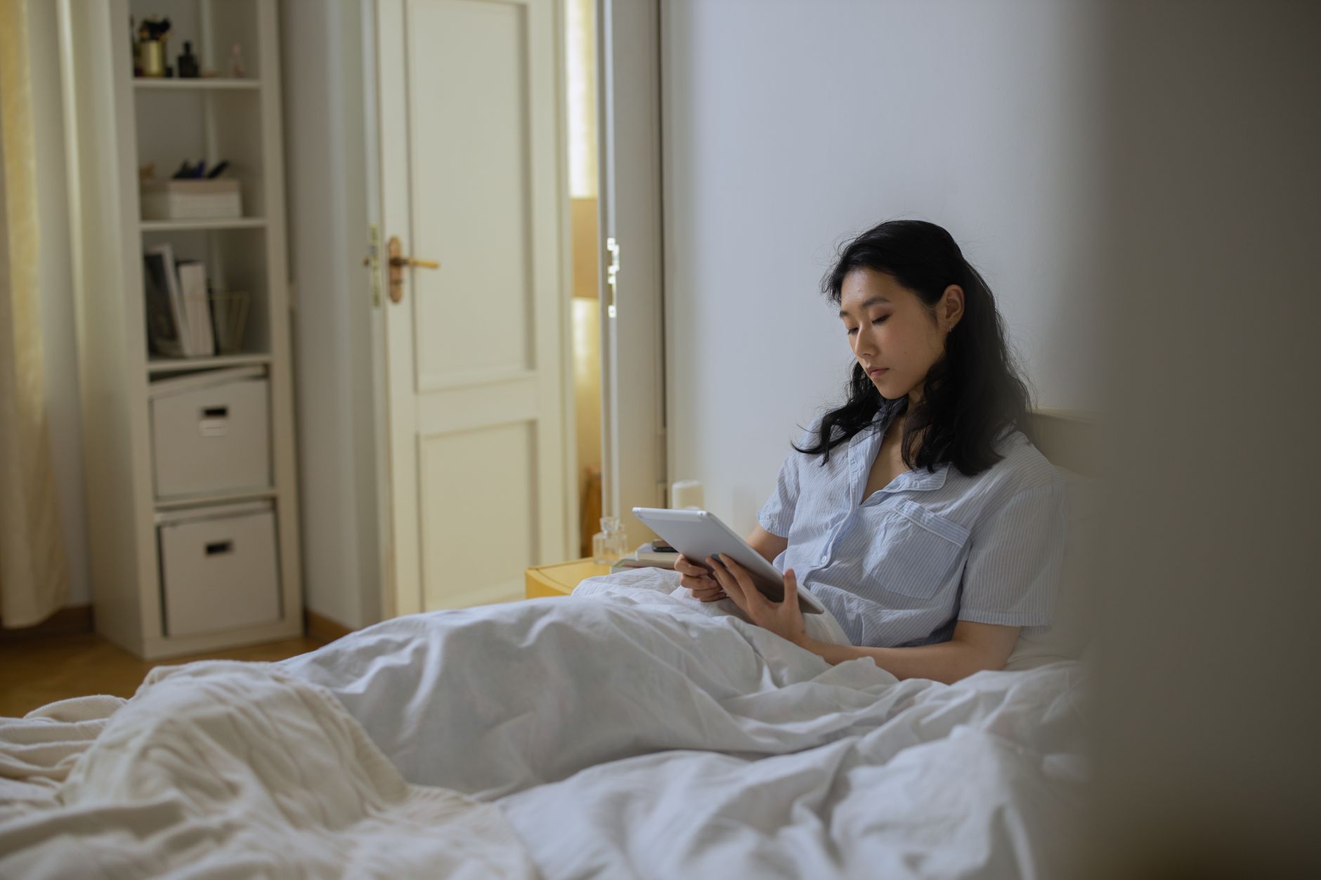 person reading app privacy policy on tablet device