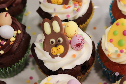 White and Brown Cupcake on the Table