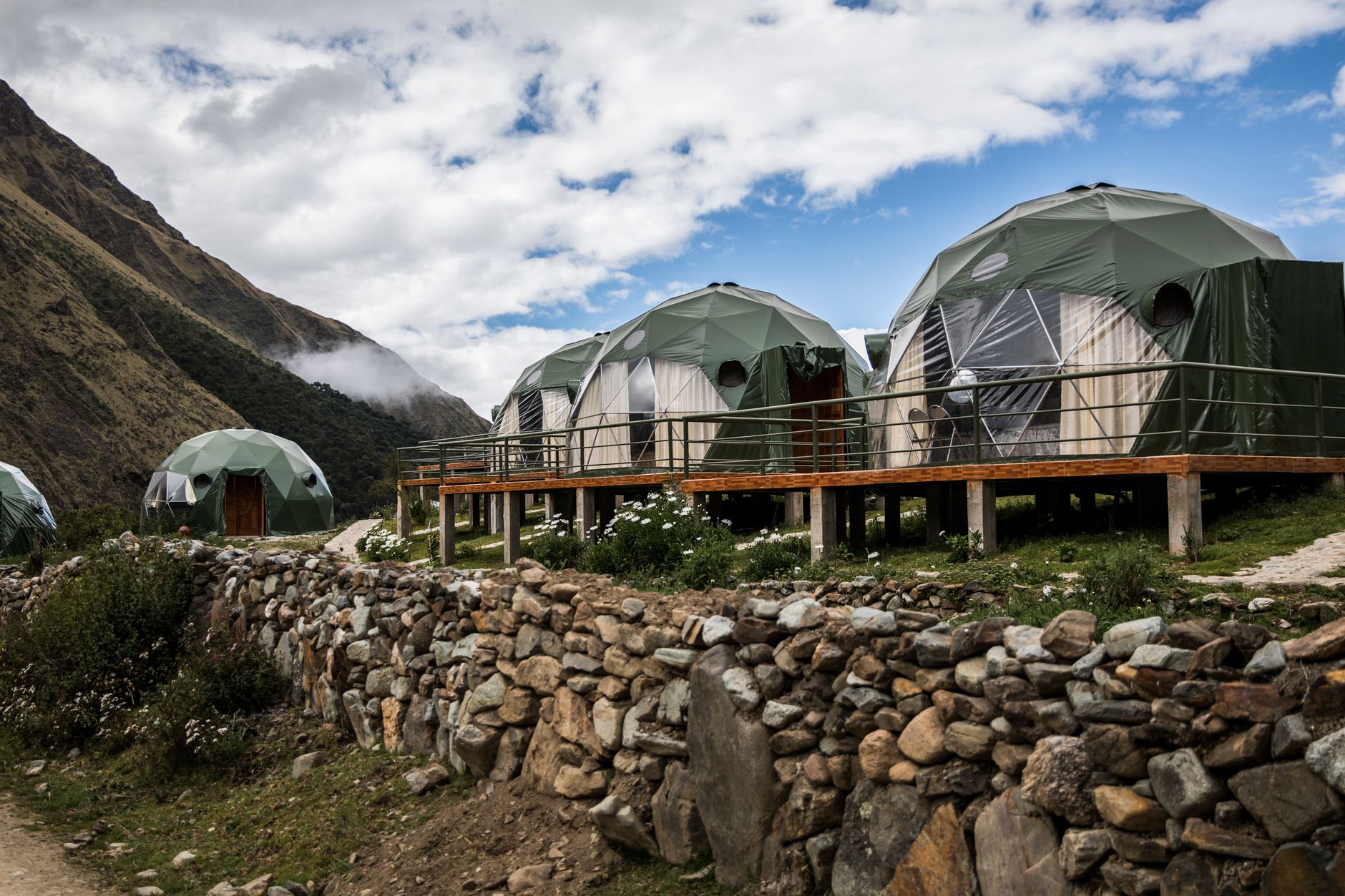 Explore sustainable eco-friendly dome tents in the scenic Peruvian Andes, perfect for nature lovers.