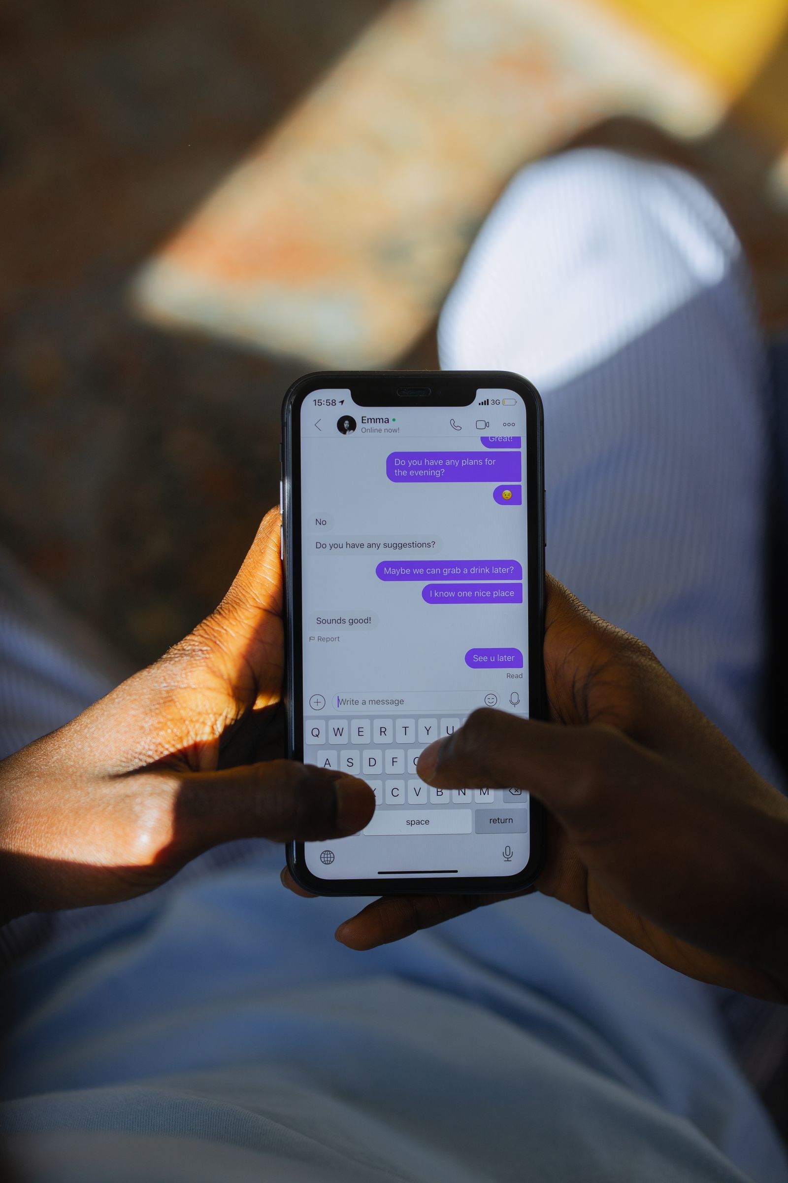 Close-up of a person using a smartphone to manage business messages