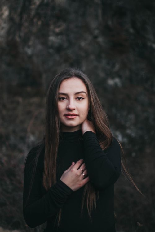 Free Elegant portrait of a woman posing outdoors in Cluj-Napoca, Romania. Stock Photo