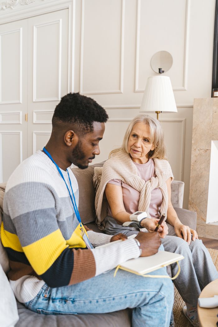 Carer visiting a client at home in the community