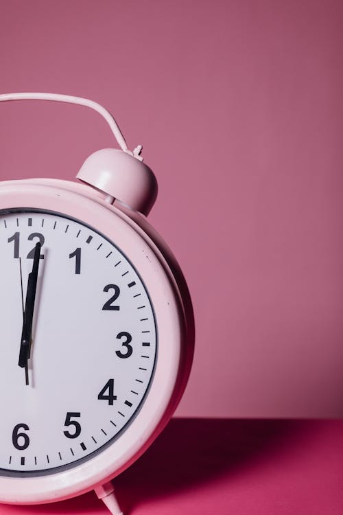 Free Close-Up Photo of Pink Alarm Clock Stock Photo
