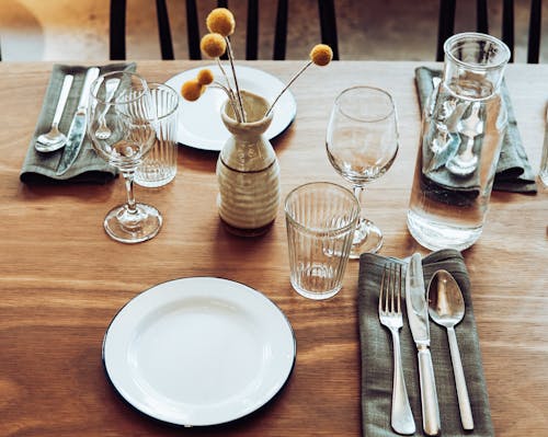 Free Elegant Dinner Table Setting for Two  Stock Photo