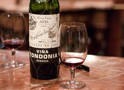 Free Viña Tondonia Reserva wine with glasses on a marble counter in Rioja, Spain. Stock Photo