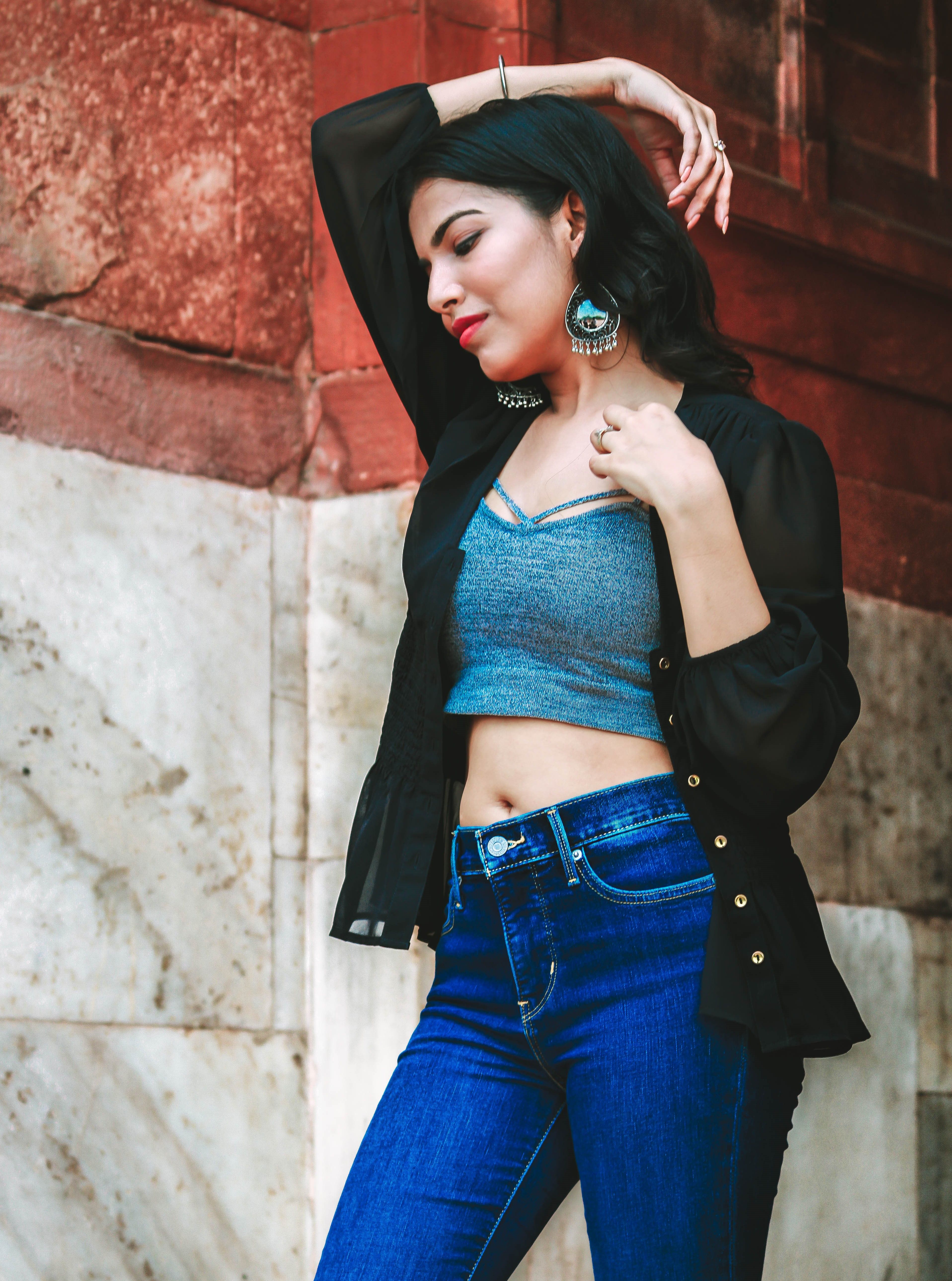 Woman in Black Jacket and Blue Denim Jeans · Free Stock Photo