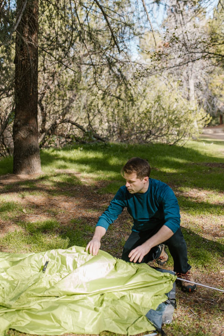 Man Setting Up The Tent