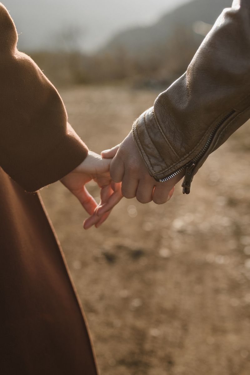 Couple holding hands