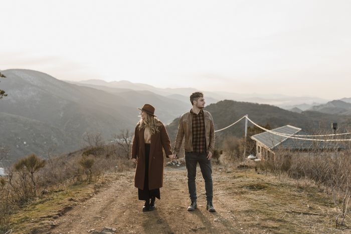 A mature couple holding hands while walking, illustrating free dating sites for over 40