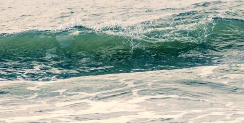 Free Close-up of ocean waves crashing on Sunset Beach, NC capturing dynamic water motion. Stock Photo